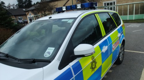 police car for driving without insurance post