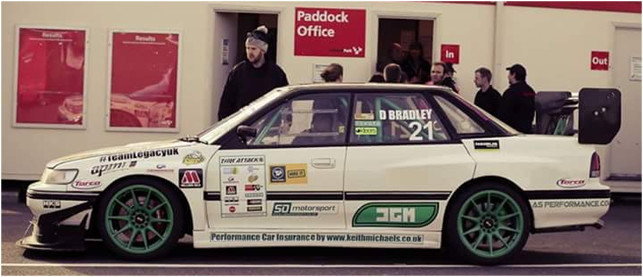 A side view of Damien Bradley's Legacy before Time Attack at Cadwell Park